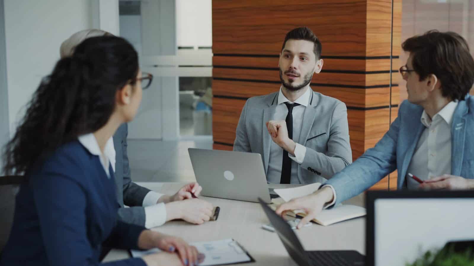 Business people collaborating in a modern office meeting